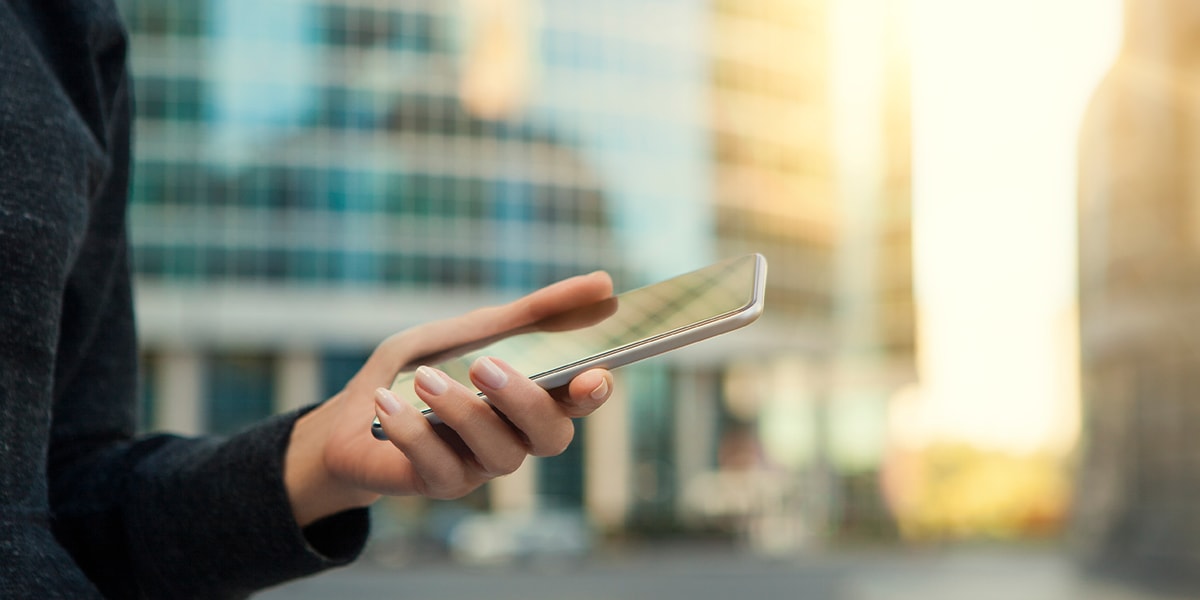 holding mobile phone