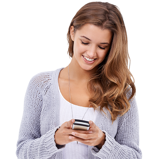 woman holding phone and smiling