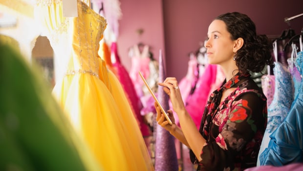 Woman working in a dress store