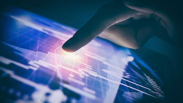 Finger touching a device screen