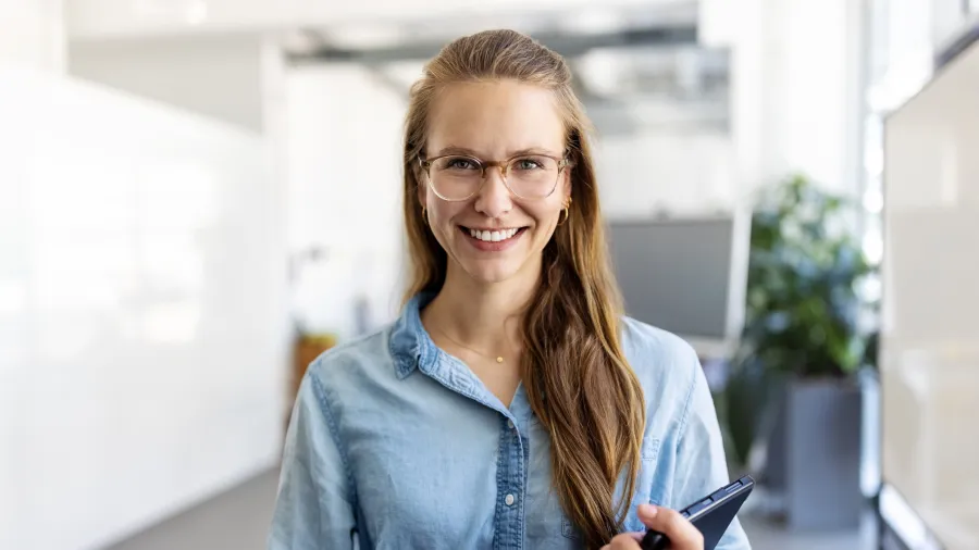 woman smiling with tablet