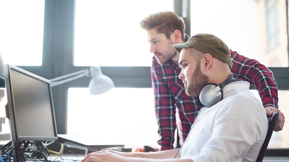 people working on a computer