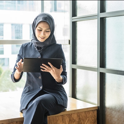 woman working on a tablet