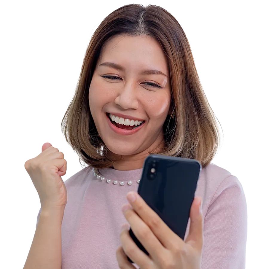 Woman looking at phone and smiling