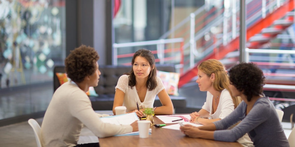 Group of people around a table in an office